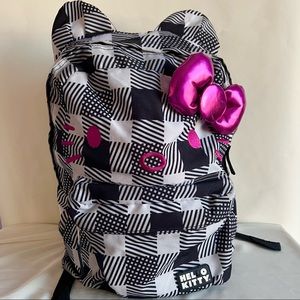 SANRIO x Loungefly HELLO KITTY patch pattern backpack with metallic fuchsia bow